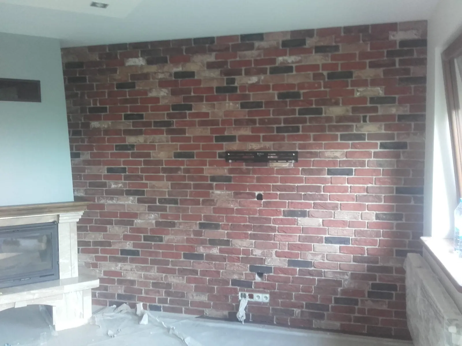 Kominek / salon — realizacja STYL-BUD