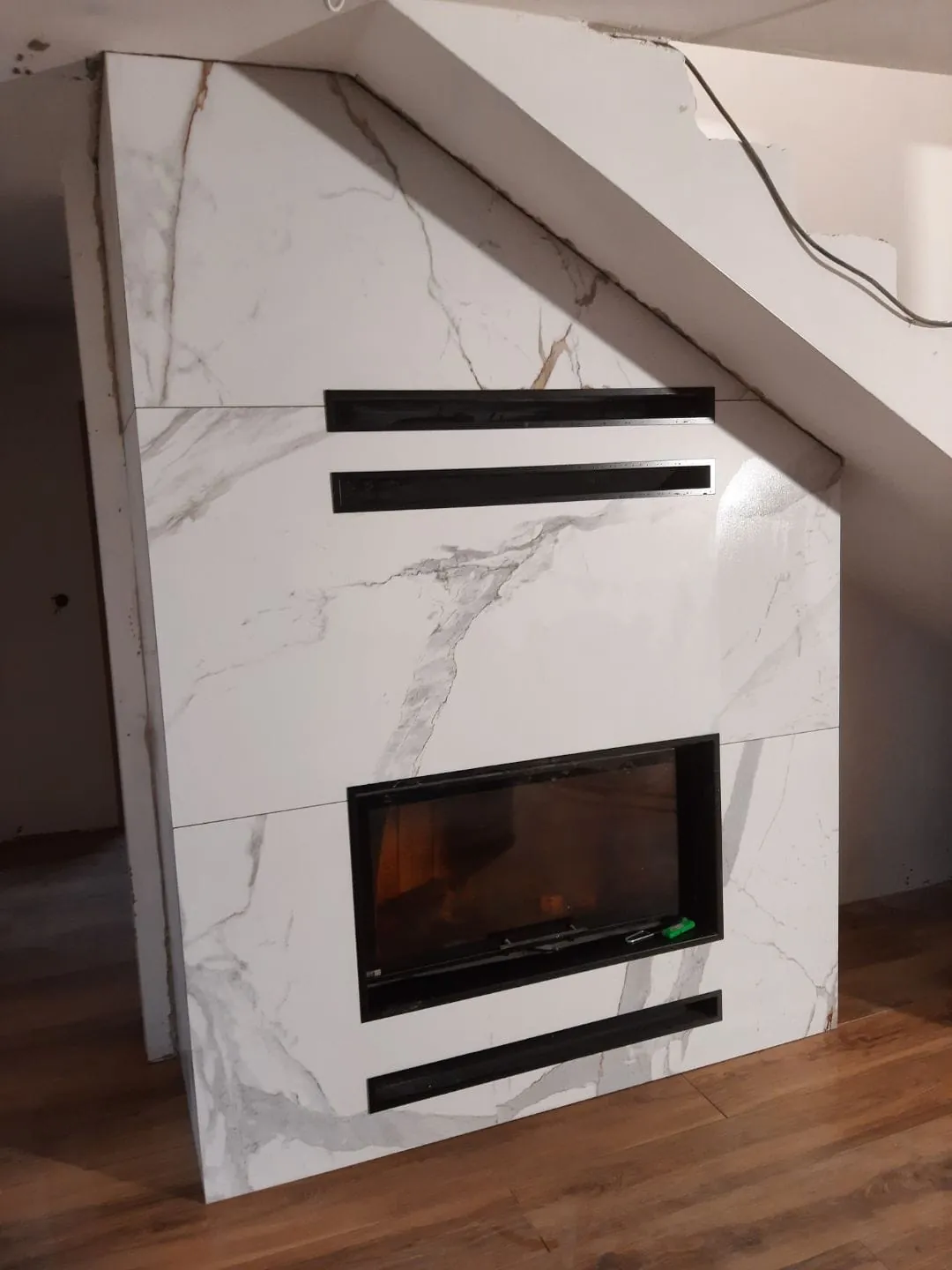 Kominek / salon — realizacja STYL-BUD